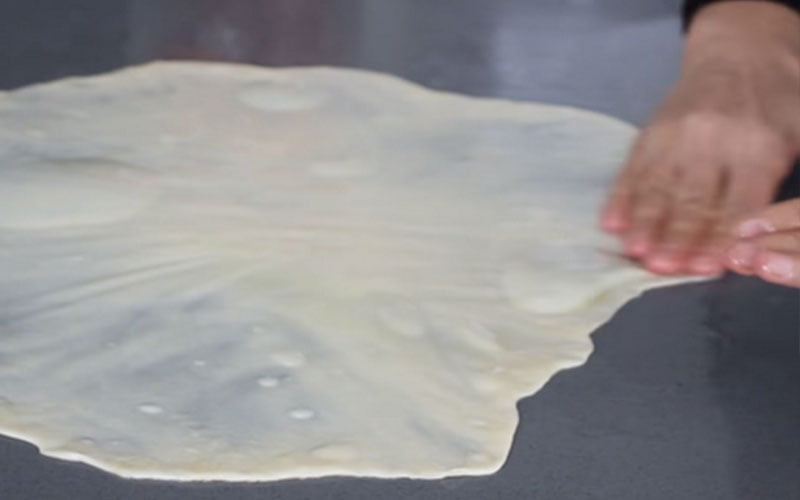 Burek Recipe - Opening the Dough by Hand