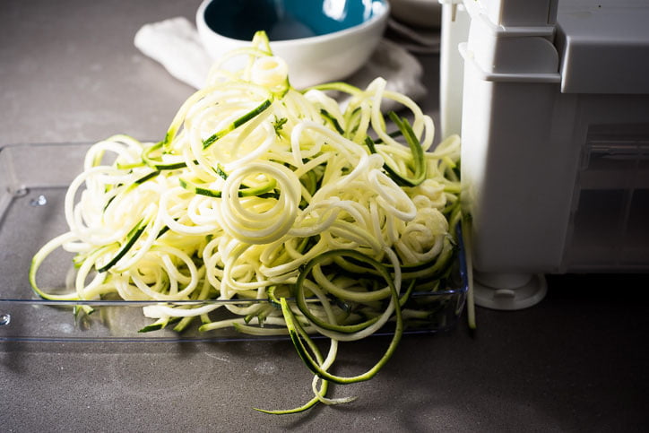 Dashi Ramen Recipe - Cutting the zucchini into spaghetti on a cutter